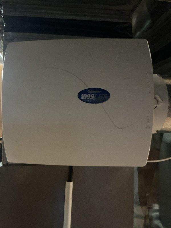 Completed comprehensive air conditioning tune-up on Bryant outdoor condensing unit and inspected indoor HVAC components including humidifier system. Performed standard maintenance procedures, verified proper system operation, and collected payment for service renewal program.