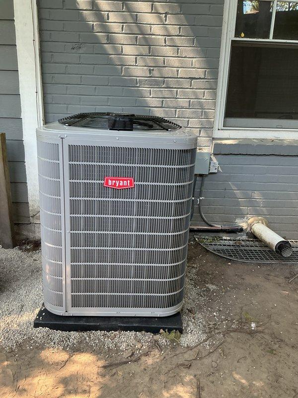 # HVAC Complete System Installation

Successfully installed two complete HVAC systems including furnaces and air conditioning units at residential property. Positioned Bryant brand condenser units on concrete pads with proper clearances from structure. Completed refrigerant line connections and electrical hookups per manufacturer specifications. Installed condensate drainage piping using white PVC with appropriate pitch and securing methods. Verified all equipment mounting, secured protective grilles, and ensured proper airflow around outdoor units. Systems tested and operational upon completion.
