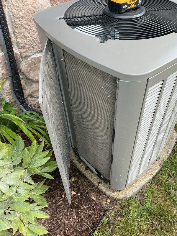 Completed comprehensive preventive maintenance tune-up on multi-zone HVAC system including both air conditioning condenser unit and gas furnace. Performed full system inspection, cleaned condenser coils, checked refrigerant levels, tested electrical connections, replaced air filters, and verified proper operation of all components. Noted deteriorated concrete equipment pad with extensive cracking beneath outdoor condenser unit; pad remains functional but shows significant weathering from environmental exposure.