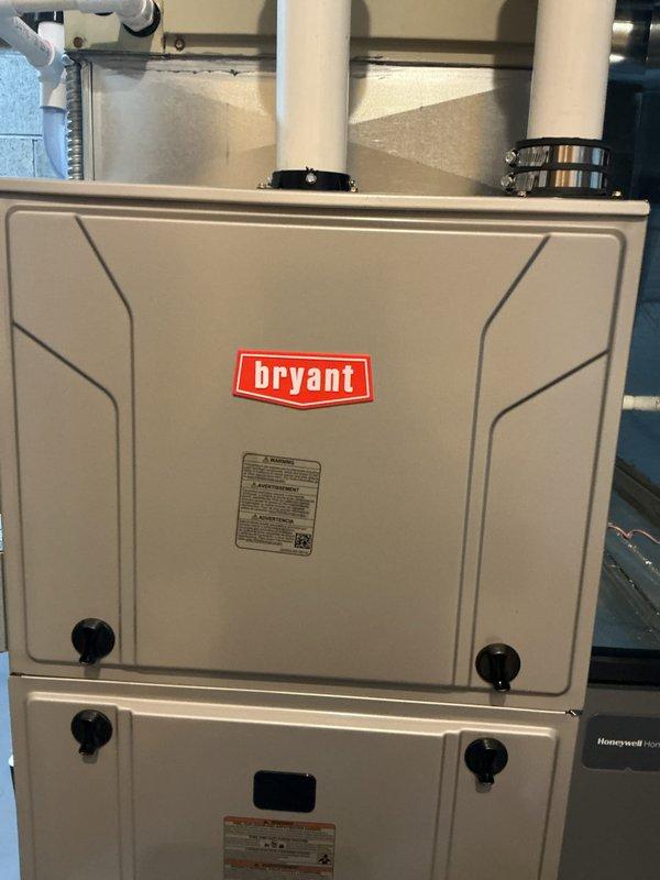 Performed complimentary tune-up and inspection of Bryant gas furnace following recent installation. Conducted comprehensive system evaluation including visual inspection of blower motor assembly, electrical connections, venting components, and all internal mechanical systems. All components verified to be in proper working condition with secure wiring connections, properly mounted hardware, and adequate clearances throughout the unit.