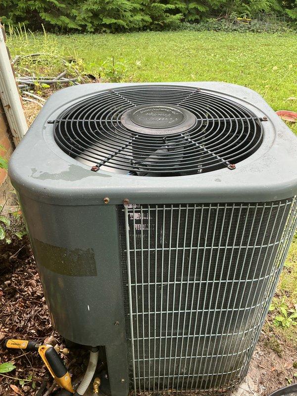 Completed scheduled AC tune-up and preventative maintenance on outdoor condensing unit. Performed electrical diagnostics using multimeter to verify proper voltage and capacitor readings at service valves, inspected refrigerant lines and connections, and evaluated overall system operation. Unit found to be functioning properly with no immediate repairs required.