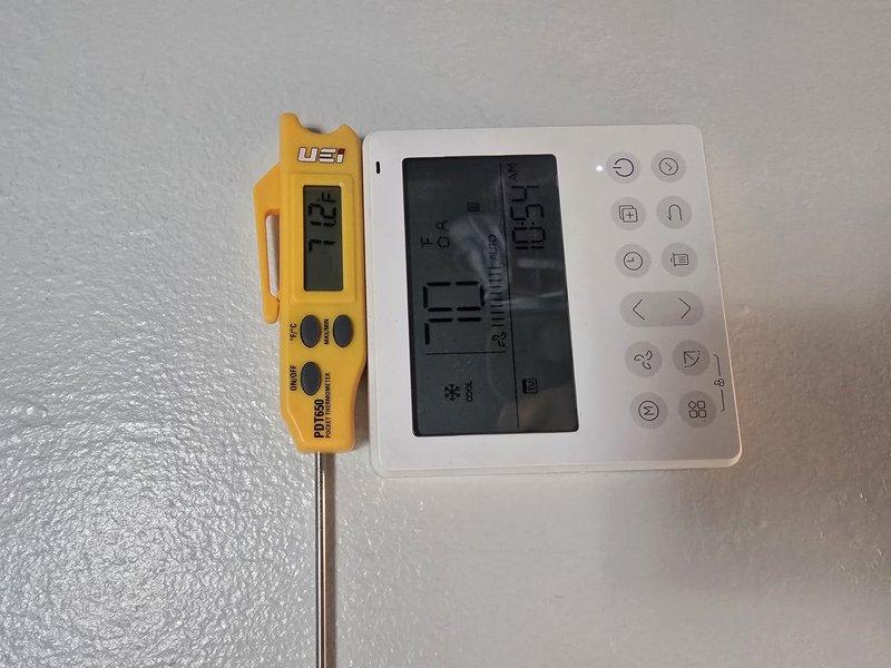 Responded to warranty callback for mini split system that had previously failed. Upon arrival, performed diagnostic temperature readings at indoor unit showing supply air temperature of 1.1°F and return air temperature discrepancy. Verified thermostat operation and settings, confirming display showing 72°F setpoint with actual reading of 103.9°F. Inspected ceiling-mounted air handler and distribution vent for proper airflow and operation. System evaluated and necessary corrective measures taken to restore proper cooling function under 30-day warranty coverage.