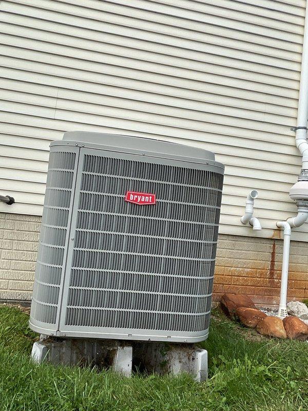 Completed scheduled air conditioning tune-up on Bryant residential condenser unit. Performed comprehensive system inspection, verified proper operation of compressor and condenser fan motor, checked refrigerant pressures and temperatures, cleaned condenser coils, inspected electrical connections and contactors, and confirmed unit is operating within manufacturer specifications. System tested and left in proper working condition.