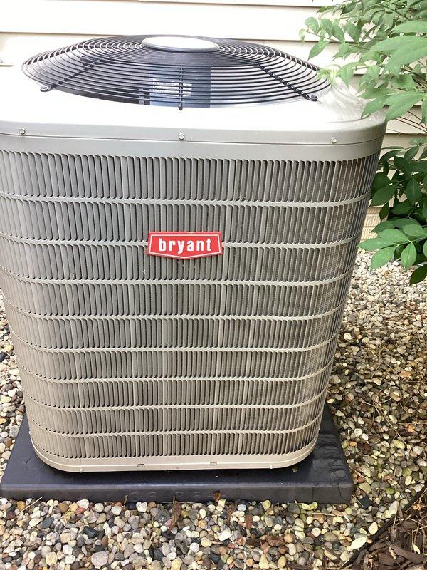 Completed annual air conditioning tune-up on 9-year-old Bryant outdoor condenser unit. Performed comprehensive preventative maintenance inspection, verified system operation in cooling mode, and confirmed unit is functioning properly with no issues identified. Unit exterior and surrounding area are clean and well-maintained with adequate clearance from landscaping.