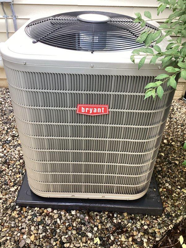 Completed annual air conditioning tune-up on 9-year-old Bryant outdoor condenser unit. Performed comprehensive preventative maintenance inspection, verified system operation in cooling mode, and confirmed unit is functioning properly with no issues identified. Unit exterior and surrounding area are clean and well-maintained with adequate clearance from landscaping.