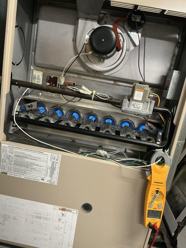 Completed comprehensive tune-up on gas furnace and air conditioning system. Performed full inspection of furnace components including draft inducer motor, burner assembly, gas valve, blower motor, and control board with all components found operating within manufacturer specifications. Conducted electrical testing with multimeter to verify proper voltage and amperage readings across all system connections.
