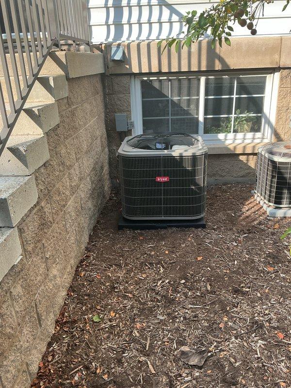 Completed full HVAC system installation including Bryant furnace model 6A2209-33 and matching condensing unit. Equipment was installed on existing concrete pad in exterior side yard with proper clearances maintained, electrical connections completed, and all manufacturer specifications verified. System tested and operational upon departure.