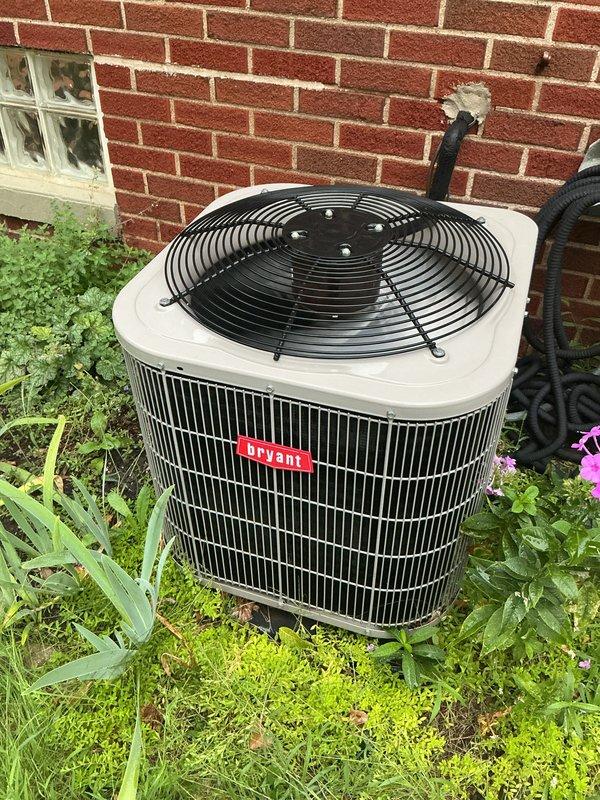Completed scheduled cooling season tune-up and preventive maintenance on Bryant brand outdoor condensing unit. Performed comprehensive system inspection, verified proper operation of all components, and documented equipment condition with photographs showing unit in functional status with adequate clearances from surrounding landscaping.