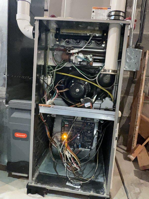 Completed comprehensive tune-up service on Bryant gas furnace system. Performed full system inspection including heat exchanger examination, blower motor operation verification, electrical connections testing, and control board diagnostics with illuminated LED status indicators confirming proper function. All components found operating within manufacturer specifications with no immediate repairs required.