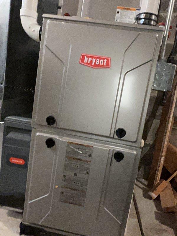 Completed comprehensive tune-up service on Bryant gas furnace system. Performed full system inspection including heat exchanger examination, blower motor operation verification, electrical connections testing, and control board diagnostics with illuminated LED status indicators confirming proper function. All components found operating within manufacturer specifications with no immediate repairs required.