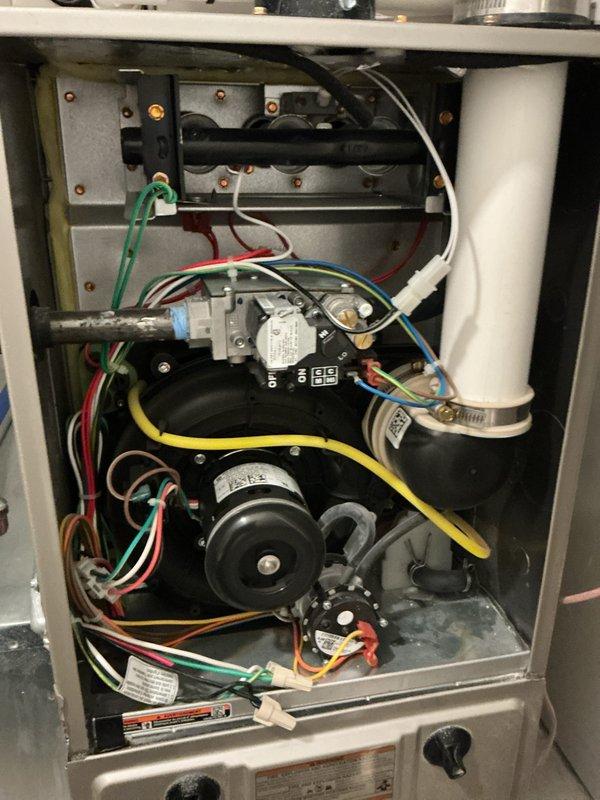 Completed comprehensive tune-up on both air conditioning system and gas furnace unit. Inspected all internal components including blower motor assembly, gas valve, ignition control board, electrical connections, and condensate drainage system. Verified proper operation of all mechanical and electrical components, confirmed secure wiring connections throughout both units, and tested system performance to ensure optimal efficiency.