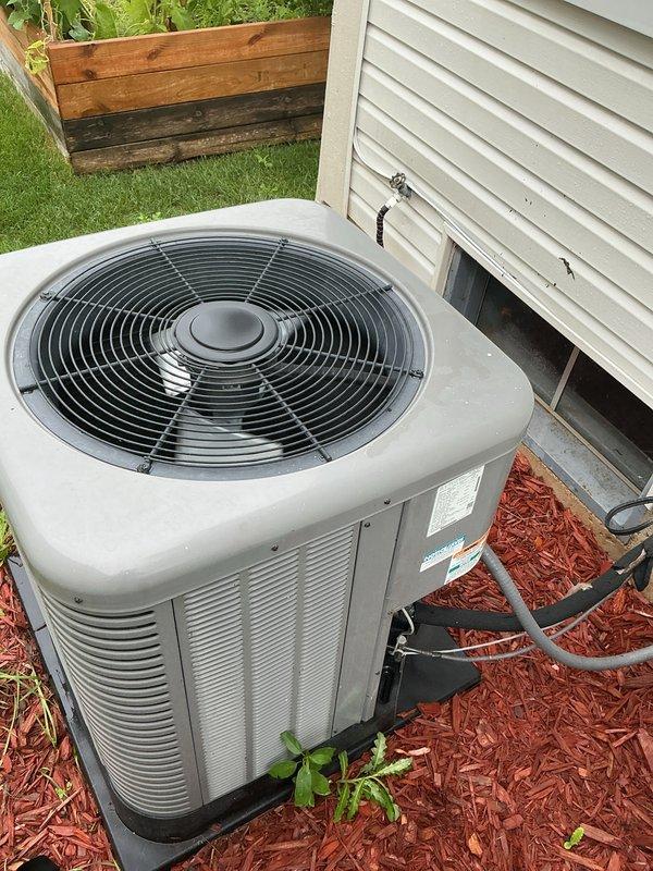 Completed comprehensive air conditioning tune-up on residential outdoor condenser unit. Performed standard preventative maintenance inspection, verified proper operation of fan motor and compressor, checked refrigerant lines for leaks, and confirmed unit is functioning within normal parameters for optimal cooling efficiency.