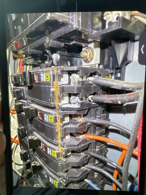 Responded to third service call for non-operational AC system under warranty. Upon arrival, discovered significant water damage in basement utility area with extensive rust-colored staining on concrete floor surrounding HVAC equipment, indicating chronic condensate drainage issues. Inspected electrical panel and found compromised wiring conditions due to moisture exposure. Identified failed condensate pump as root cause of recurring system failures, leading to water accumulation and safety concerns with electrical components. Replaced defective condensate pump, cleared drain lines, tested system operation, and verified proper drainage flow. Recommended monitoring for additional water intrusion and potential electrical panel evaluation due to previous water exposure.