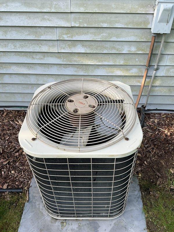 Completed scheduled preventive maintenance on residential air conditioning system. Performed comprehensive inspection of outdoor condenser unit, verified proper operation of fan assembly and motor, checked refrigerant lines for leaks and proper insulation, and confirmed unit was level on concrete pad. Cleaned accumulated debris from fan guard and exterior housing to ensure optimal airflow and system efficiency.