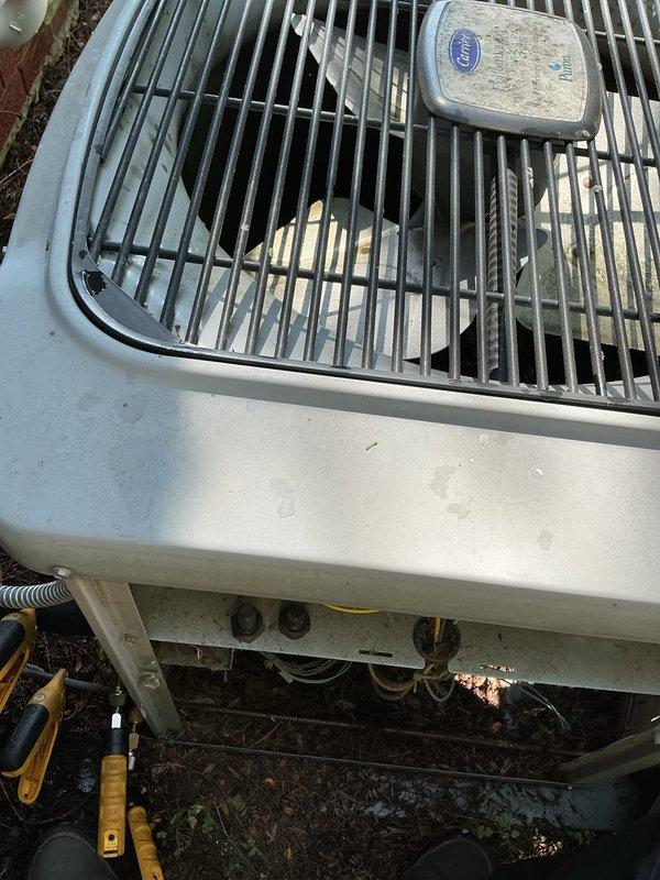 Completed comprehensive air conditioning tune-up on residential outdoor condensing unit. Performed standard maintenance protocol including inspection of condenser coil, refrigerant lines, electrical connections, and fan assembly; verified proper operation of all components and documented equipment condition with photographs.
