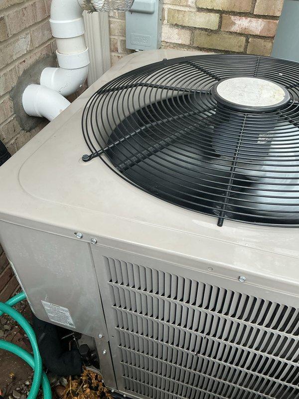 Completed scheduled AC tune-up on residential outdoor condensing unit. Performed comprehensive system inspection, tested electrical components with multimeter confirming proper voltage readings, cleaned condenser coils, and verified proper airflow through unit venting. All components operating within normal parameters with no deficiencies noted.
