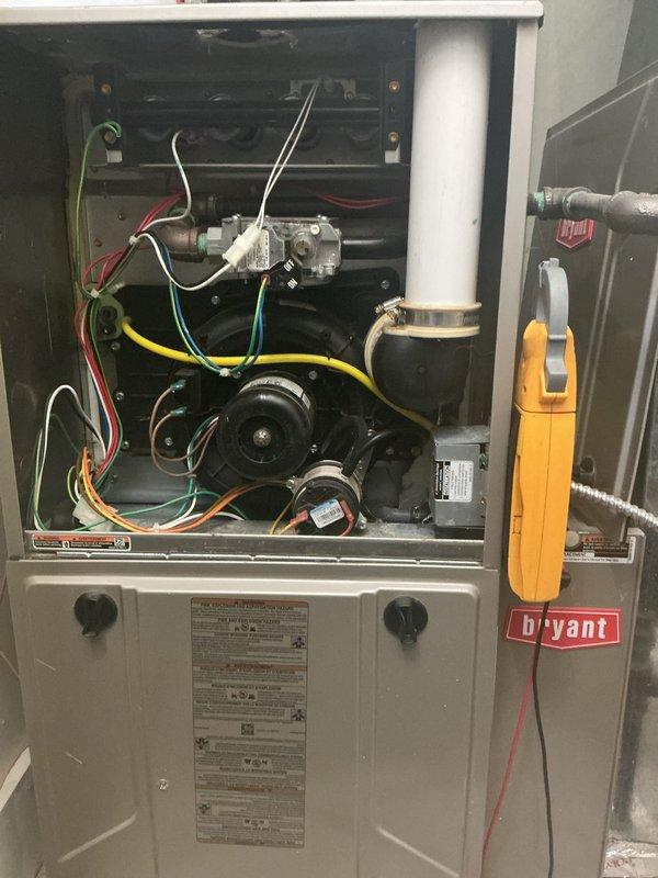 Completed comprehensive gas furnace tune-up on Bryant HVAC unit at rental property. Performed full system inspection including electrical diagnostics with clamp meter, checked gas valve operation, inspected blower motor assembly, verified all wire connections, and tested control board functionality. Provided and installed air filters on-site as requested, with second unit tune-up performed at companion rental property per customer's coordination request.