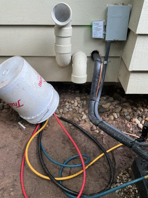 Completed installation of new Bryant air conditioning system with evaporator coil. Installed outdoor condensing unit on gravel pad against exterior wall, connected refrigerant lines with proper insulation, and integrated new evaporator coil with existing furnace system. Ran and secured all refrigerant piping, electrical connections, and PVC condensate drainage lines. System tested, charged to manufacturer specifications, and verified proper operation of all components.