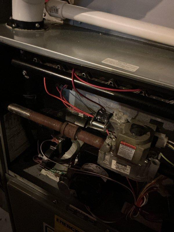 Completed preventive maintenance tuneup on 8-year-old gas furnace unit. Performed comprehensive inspection of all mechanical and electrical components including gas valve assembly, burner assembly, heat exchanger, blower motor, and ignition system. Cleaned and tested all safety controls. Inspected gas piping connections for leaks and proper operation. Verified electrical connections and wiring integrity throughout unit. Checked and adjusted airflow as needed. Unit operating within manufacturer specifications at time of departure.