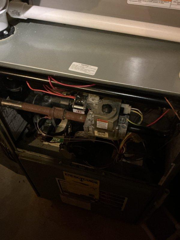 Completed preventive maintenance tuneup on 8-year-old gas furnace unit. Performed comprehensive inspection of all mechanical and electrical components including gas valve assembly, burner assembly, heat exchanger, blower motor, and ignition system. Cleaned and tested all safety controls. Inspected gas piping connections for leaks and proper operation. Verified electrical connections and wiring integrity throughout unit. Checked and adjusted airflow as needed. Unit operating within manufacturer specifications at time of departure.