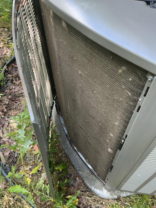 Completed scheduled AC tune-up and investigated reported grinding noise occurring periodically during system startup. Upon inspection, found condenser unit with heavily clogged coils due to significant dirt, debris, and organic matter accumulation affecting airflow and system performance. Performed standard maintenance procedures including coil cleaning, component inspection, and operational testing to restore proper function and eliminate noise concern.
