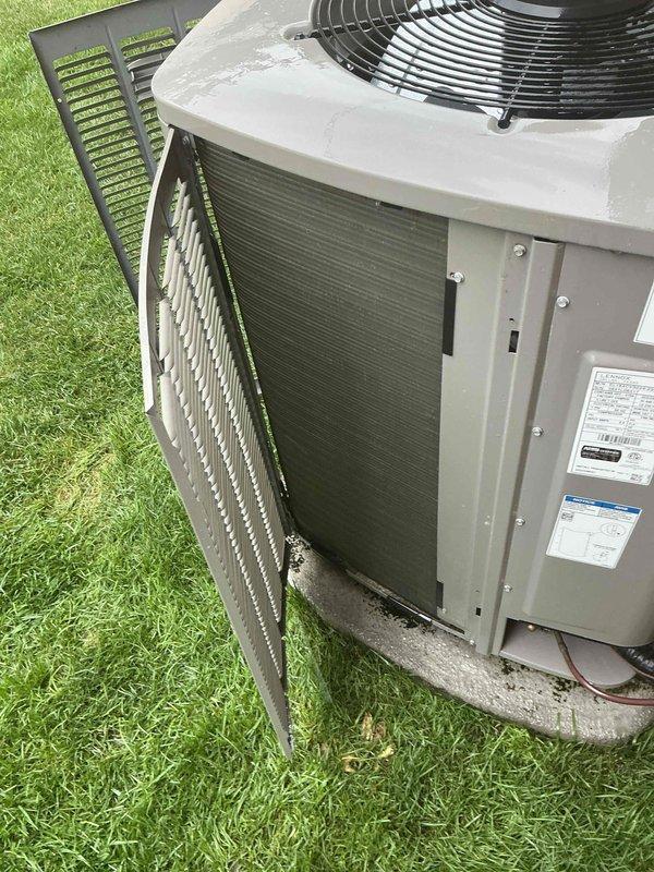 Completed scheduled AC tune-up and investigated reported grinding noise occurring periodically during system startup. Upon inspection, found condenser unit with heavily clogged coils due to significant dirt, debris, and organic matter accumulation affecting airflow and system performance. Performed standard maintenance procedures including coil cleaning, component inspection, and operational testing to restore proper function and eliminate noise concern.