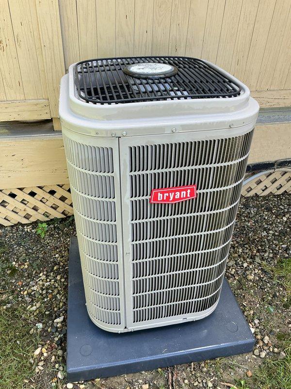 Completed scheduled maintenance on Bryant outdoor condensing unit. Performed standard cooling system inspection, verified operational status of unit positioned on concrete pad with proper gravel base and clearances. Unit found in working condition with normal outdoor weathering, no significant issues identified during recurring service visit.
