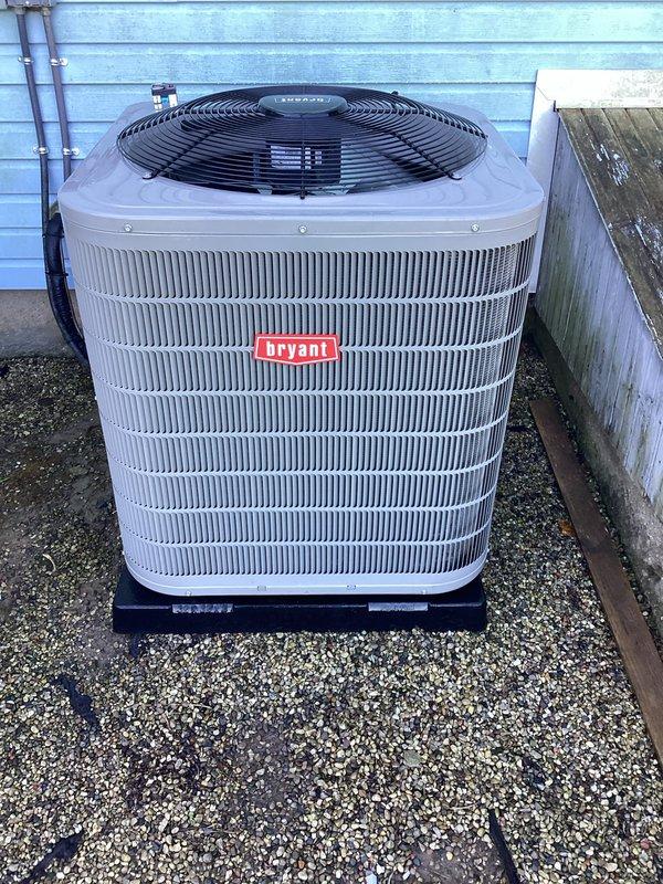 Completed scheduled air conditioning tune-up on Bryant condensing unit. Performed comprehensive preventive maintenance inspection, verified system operation, and confirmed unit is functioning properly with no issues identified. Equipment found in good condition with clean coil fins and proper installation on gravel base with adequate drainage.