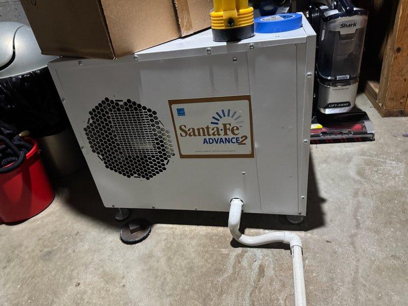 Completed scheduled air conditioning tune-up and preventative maintenance on residential cooling system. Inspected outdoor condenser unit, verified proper operation of compressor and fan motor, and checked basement dehumidifier unit for optimal performance. All equipment operating within normal parameters with no deficiencies noted.