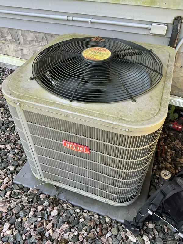 Completed scheduled maintenance on Bryant air conditioning system. Performed comprehensive inspection of outdoor condenser unit, including cleaning of coils, verification of proper airflow through louvered panels, and assessment of fan operation. Unit showed normal wear consistent with age, with condenser coils and cabinet inspected for operational efficiency. All system components functioning within manufacturer specifications at time of service completion.