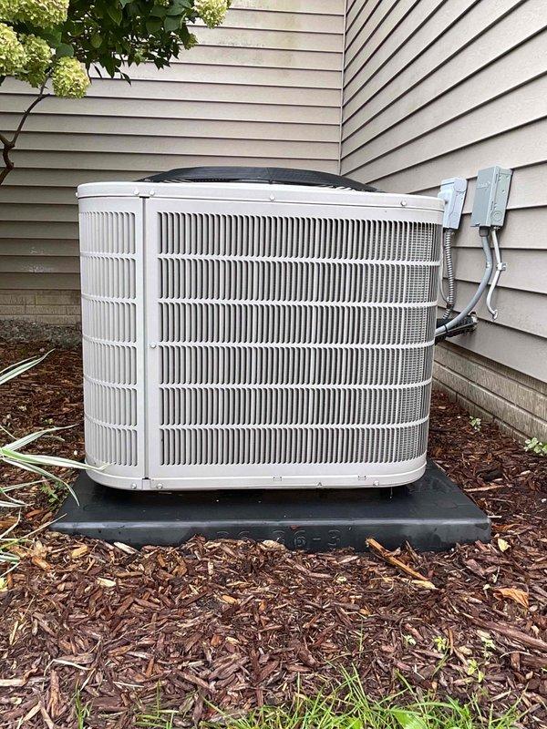 Completed comprehensive AC tune-up on residential outdoor condenser unit. Performed full system inspection, verified proper operation of all components, cleaned condenser coils, checked refrigerant levels, tested electrical connections at disconnect box, and confirmed unit is operating within manufacturer specifications for optimal cooling performance.
