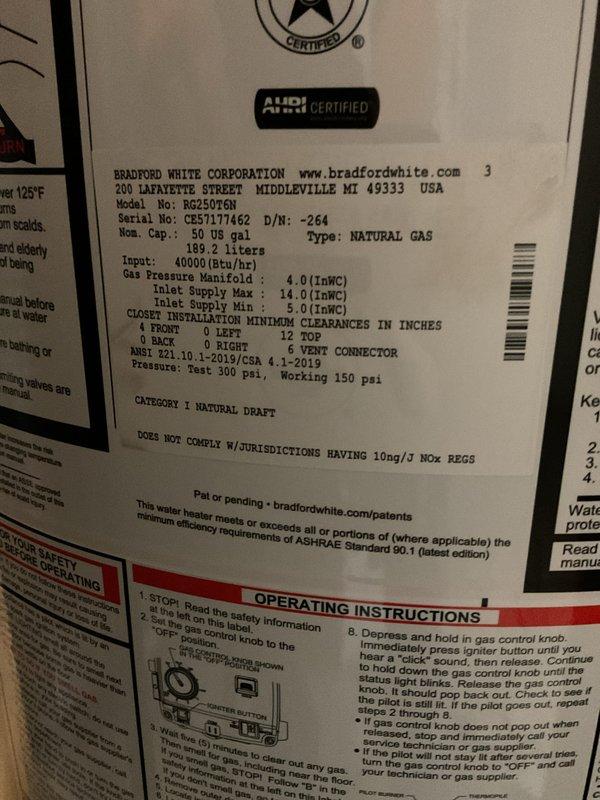 Installed a Bradford White 50-gallon natural gas tank water heater (Model RG250T6N) in residential utility closet. Connected copper supply lines, installed expansion tank, properly vented exhaust system, and verified all manufacturer specifications including gas pressure settings and clearance requirements were met per ANSI standards.