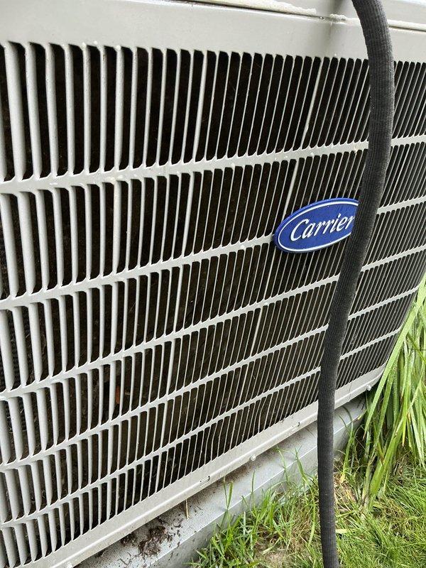 Completed comprehensive AC tune-up on Carrier condensing unit. Performed full system inspection, verified proper operation of all components, cleaned condenser coils, checked refrigerant levels, and tested electrical connections. Unit operating within manufacturer specifications with no issues identified.
