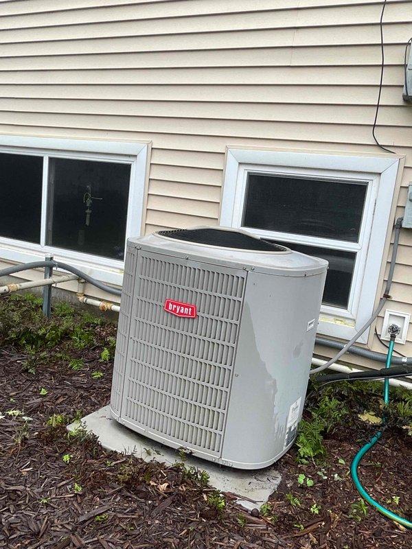Completed AC tune-up on 16-year-old Bryant residential air conditioning system. Performed standard maintenance procedures including inspection of outdoor condenser unit, verification of proper system operation, and assessment of overall equipment condition. Customer reported noisy condensate pump in basement during operation, which was noted for monitoring; primary cooling system confirmed to be functioning properly at time of service.