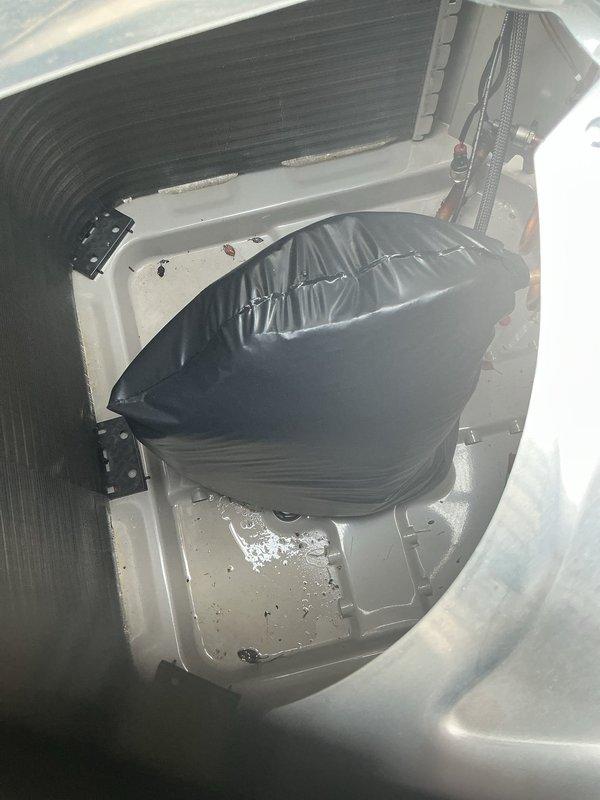 Responded to warranty call regarding failed city inspection due to water pooling and leak concerns. Upon arrival, accessed air handler unit and inspected internal components, including evaporator coil assembly and drain system. Installed temporary protective covering over internal components during diagnostic process. Evaluated condensate drainage system and identified source of water accumulation that resulted in inspection failure. Verified outdoor Bryant condenser unit operation and checked refrigerant lines for proper insulation and connection integrity. Photographed conditions for documentation purposes. Addressed drainage issue to ensure proper water evacuation from system and prevent future pooling. Unit tested and verified operational upon completion of repairs.