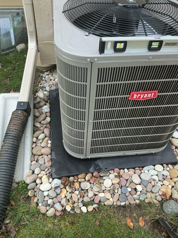 Responded to warranty call regarding failed city inspection due to water pooling and leak concerns. Upon arrival, accessed air handler unit and inspected internal components, including evaporator coil assembly and drain system. Installed temporary protective covering over internal components during diagnostic process. Evaluated condensate drainage system and identified source of water accumulation that resulted in inspection failure. Verified outdoor Bryant condenser unit operation and checked refrigerant lines for proper insulation and connection integrity. Photographed conditions for documentation purposes. Addressed drainage issue to ensure proper water evacuation from system and prevent future pooling. Unit tested and verified operational upon completion of repairs.
