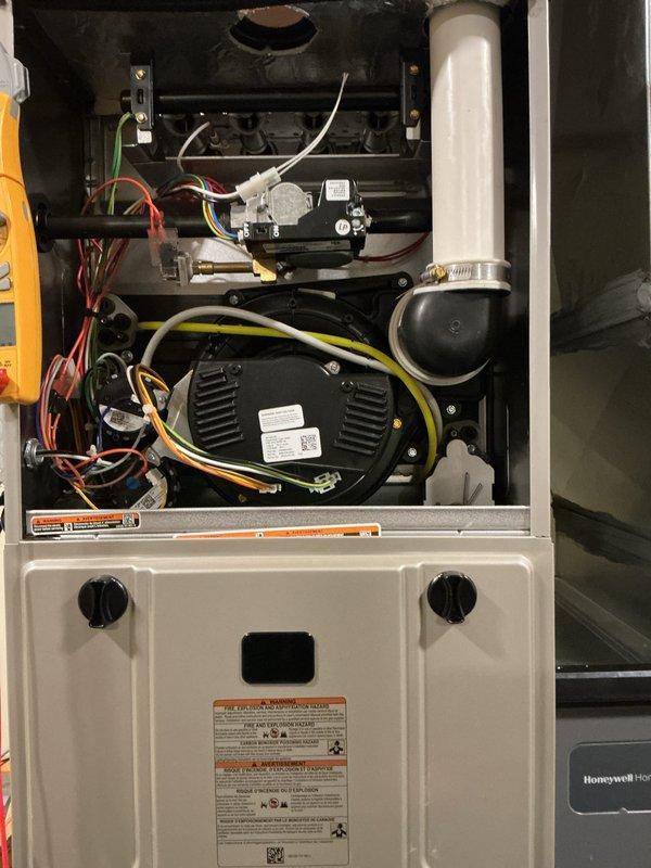 Completed comprehensive air conditioning and gas furnace tune-up as part of final complimentary maintenance included with system installation. Performed complete inspection of outdoor condenser unit, verified proper operation of all components, and conducted thorough cleaning and maintenance of indoor furnace system including blower assembly, electrical connections, and control components.