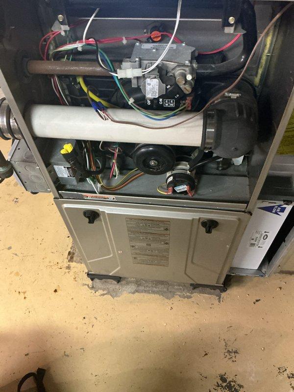 Completed comprehensive furnace tune-up and seasonal maintenance service. Performed thorough inspection of all internal components including gas valve assembly, ignition system, blower motor, and heat exchanger. Cleaned burner assembly, verified proper operation of all safety controls, and inspected electrical connections throughout the unit. Checked gas pressure, tested thermostat operation, and confirmed proper venting. All components found to be operating within manufacturer specifications with no issues identified. Unit left in proper working condition and ready for heating season.