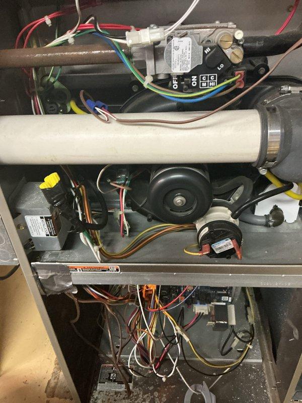 Completed comprehensive furnace tune-up and seasonal maintenance service. Performed thorough inspection of all internal components including gas valve assembly, ignition system, blower motor, and heat exchanger. Cleaned burner assembly, verified proper operation of all safety controls, and inspected electrical connections throughout the unit. Checked gas pressure, tested thermostat operation, and confirmed proper venting. All components found to be operating within manufacturer specifications with no issues identified. Unit left in proper working condition and ready for heating season.