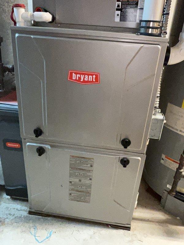 Completed regularly scheduled preventive maintenance on a 12-year-old Bryant gas furnace. Performed comprehensive tune-up including inspection of blower motor assembly, heat exchanger, burner components, and gas valve operation. Verified all electrical connections, tested safety controls, and confirmed proper airflow through the system. Examined PVC condensate drain lines and venting system for proper installation and drainage. Checked furnace filter, inspected ductwork connections, and verified thermostat operation. All components found to be functioning within normal parameters with no deficiencies noted. System is operating efficiently and safely with no immediate service needs identified.