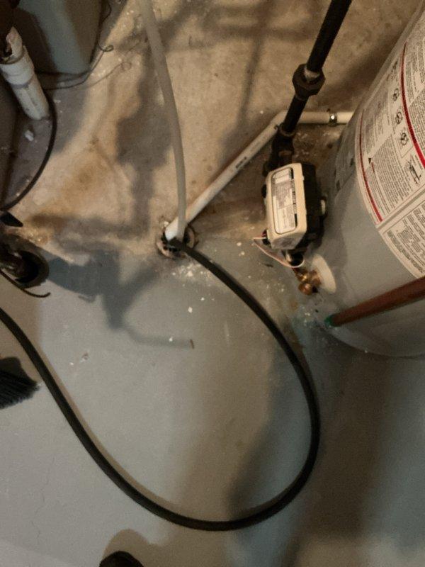 Completed installation of new air conditioning system with evaporator coil in residential basement utility area. System was properly integrated with existing Bryant furnace, including connection of refrigerant lines, condensate drainage, and electrical components. All ductwork connections were secured to the new evaporator coil mounted above the furnace, and the installation was tested to verify proper operation and airflow throughout the system.