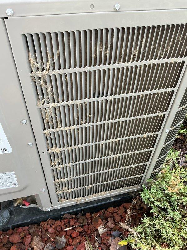 Completed scheduled air conditioning tune-up and standard maintenance service on residential split system. Performed comprehensive inspection of indoor furnace unit including blower motor assembly, gas valve components, electrical connections, and control systems; all components found operating within normal parameters. Inspected outdoor condenser unit, noting weathering and dirt accumulation on exterior fins with water runoff staining; unit operational with adequate airflow through coil sections.