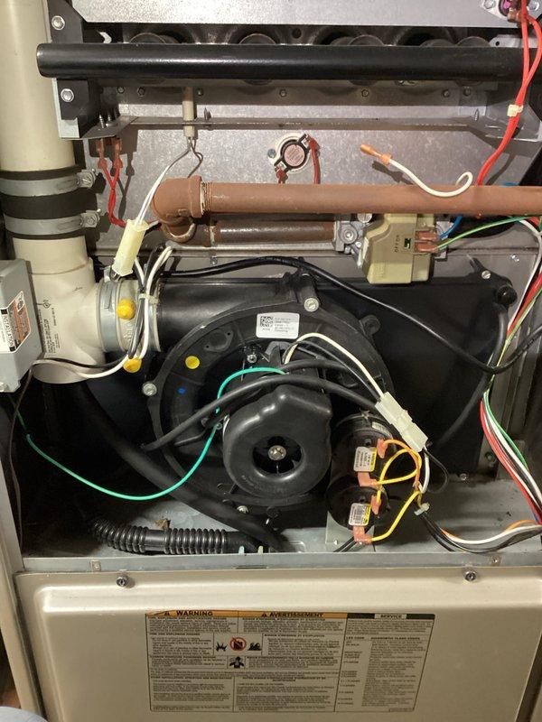 Completed comprehensive preventive maintenance on both heating and cooling systems. Performed full inspection of gas furnace, including blower motor assembly, heat exchanger, electrical connections, gas supply lines, and condensate drainage system. Verified all wiring connections, tested safety controls, and confirmed proper operation of all furnace components. Conducted complete maintenance on outdoor air conditioning condenser unit, inspecting compressor, fan motor, and condenser coils. Noted excessive vegetation growth around condenser base requiring clearance for optimal airflow and unit performance. Cleaned accessible components, verified refrigerant lines and electrical disconnect, and confirmed system operational status. Both heating and cooling systems tested and found operational following maintenance procedures.