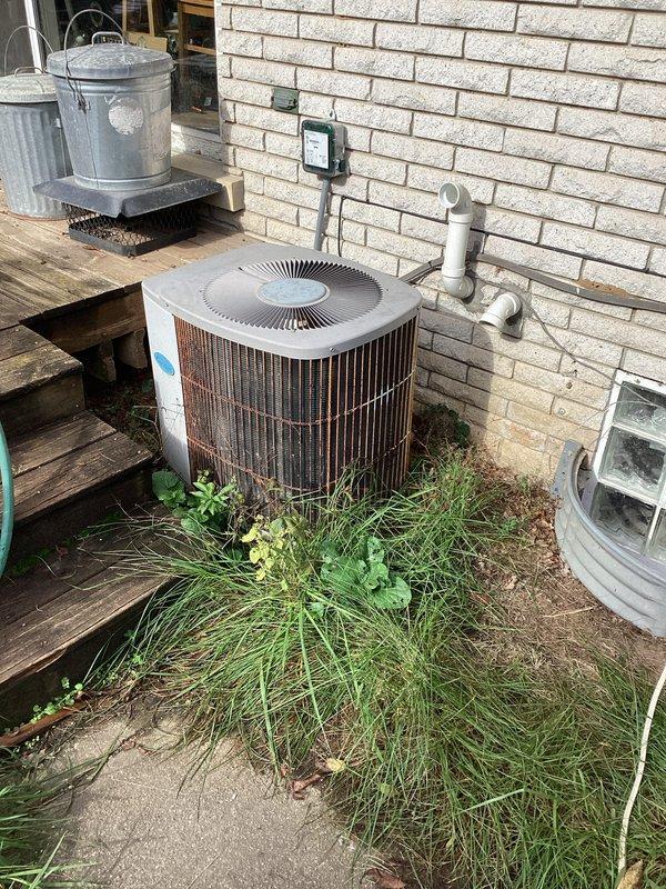Completed comprehensive preventive maintenance on both heating and cooling systems. Performed full inspection of gas furnace, including blower motor assembly, heat exchanger, electrical connections, gas supply lines, and condensate drainage system. Verified all wiring connections, tested safety controls, and confirmed proper operation of all furnace components. Conducted complete maintenance on outdoor air conditioning condenser unit, inspecting compressor, fan motor, and condenser coils. Noted excessive vegetation growth around condenser base requiring clearance for optimal airflow and unit performance. Cleaned accessible components, verified refrigerant lines and electrical disconnect, and confirmed system operational status. Both heating and cooling systems tested and found operational following maintenance procedures.