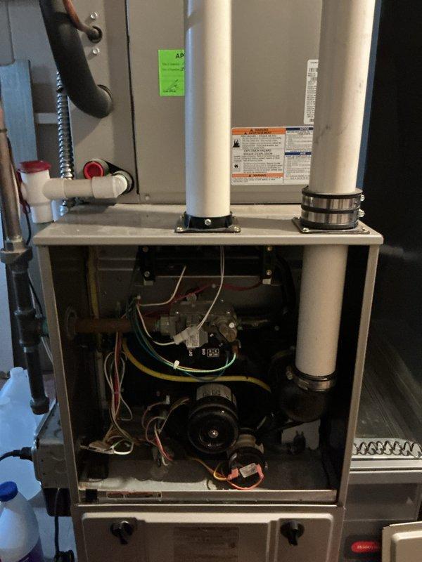 Completed scheduled maintenance on gas furnace and 11kW Honeywell generator as part of membership renewal service. Performed comprehensive inspection of furnace interior components including burner assembly, gas valve, blower motor, heat exchanger, and electrical connections. Verified proper operation of intake and exhaust PVC venting system with secure mounting brackets. Inspected all wiring harnesses, safety controls, and manufacturer labels for compliance. Conducted general maintenance procedures on standby generator unit per manufacturer specifications. All systems tested and operating within normal parameters upon completion.