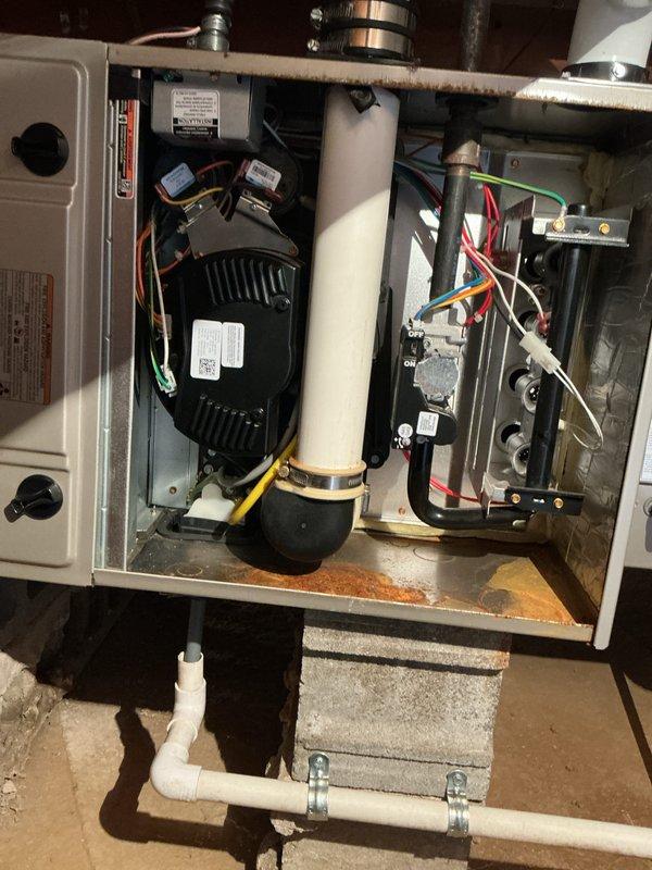 Completed comprehensive preventive maintenance on Bryant gas furnace and air conditioning system. Performed multi-point inspection including blower motor operation, electrical connections, refrigerant line set, condensate drainage system, and venting components. All components found operating within normal parameters; system tested and confirmed functioning properly for continued heating and cooling service.