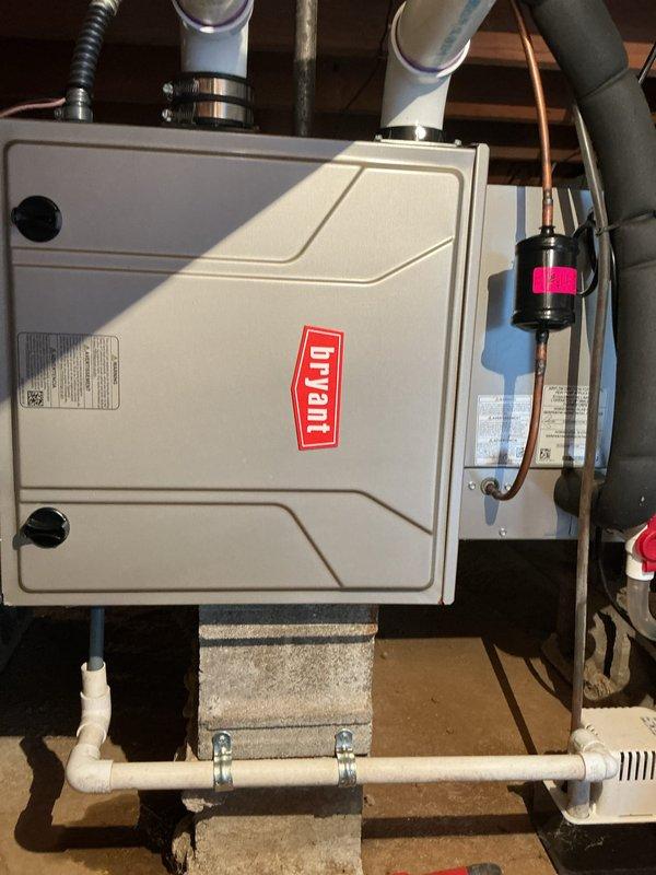 Completed comprehensive preventive maintenance on Bryant gas furnace and air conditioning system. Performed multi-point inspection including blower motor operation, electrical connections, refrigerant line set, condensate drainage system, and venting components. All components found operating within normal parameters; system tested and confirmed functioning properly for continued heating and cooling service.