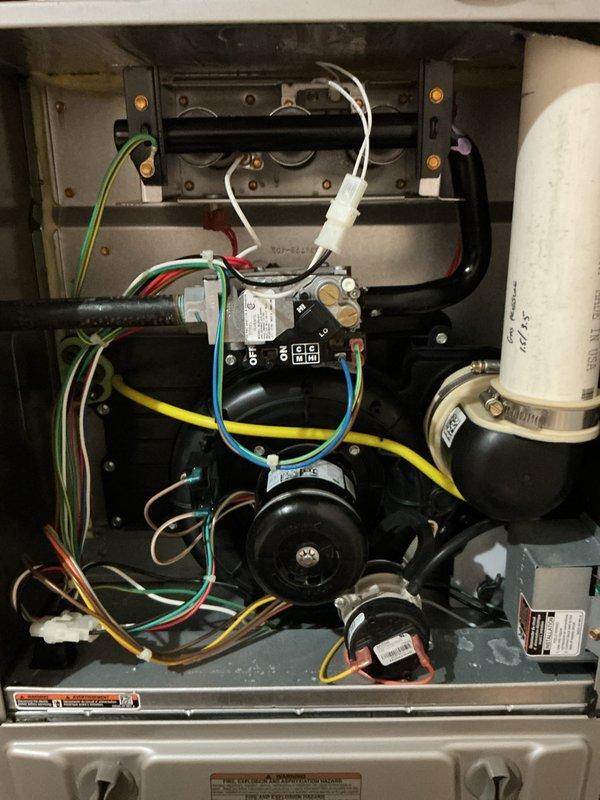 Completed comprehensive multi-system tune-up service on both air conditioning and gas furnace units. Performed thorough inspection of indoor furnace components including blower motor, electrical connections, capacitor, and burner assembly, verifying all wiring connections and mechanical components were secure and functioning properly. Inspected outdoor condensing unit, checked refrigerant lines, and confirmed proper operation of condenser fan and compressor. All systems tested and operating within normal parameters.