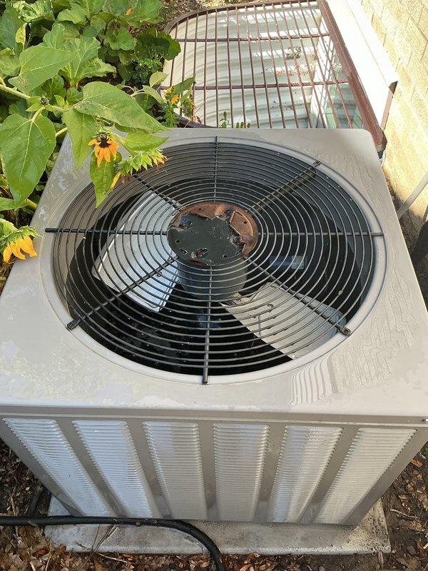 Performed comprehensive air conditioning tune-up and maintenance on outdoor condenser unit as part of scheduled recurring service covered under active membership plan. Conducted thorough inspection of unit components including fan motor operation, condenser coil condition, refrigerant line connections, and electrical systems. Unit found operating within normal parameters with all safety controls functioning properly; system ready for continued cooling operation.