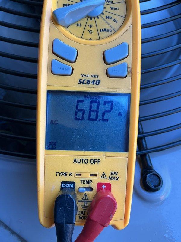 Completed scheduled AC tune-up on Bryant HVAC system located in basement utility room. Performed comprehensive system inspection, verified electrical connections, checked refrigerant levels, and tested system operation with digital multimeter confirming proper voltage readings at 68.2 VAC.